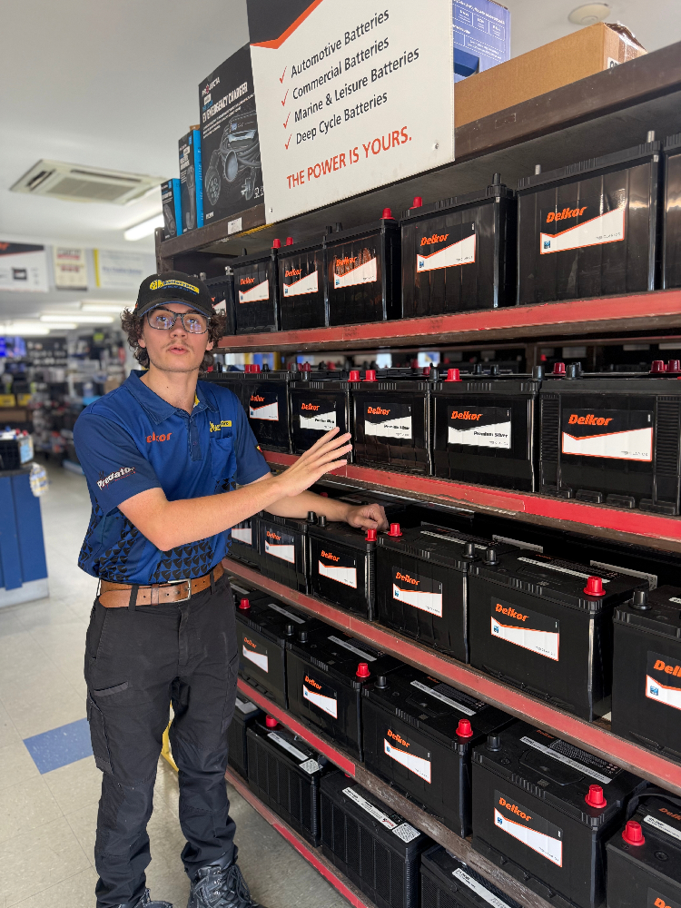 A1 Batterypro staff member showing our large range of replacement batteries